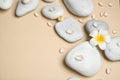 Flat lay composition with spa stones and space for text Royalty Free Stock Photo