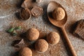 Flat lay composition with spoon and chocolate truffles Royalty Free Stock Photo