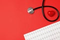 Flat lay composition with stethoscope, heart figure and cardiogram on color background. Royalty Free Stock Photo