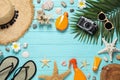 Flat lay composition with  beach accessories on light blue wooden background, space for text Royalty Free Stock Photo