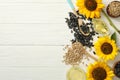 Flat lay composition with sunflower oil on white wooden table, space for text Royalty Free Stock Photo