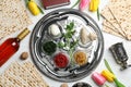 Flat lay composition with symbolic Passover Pesach items and meal Royalty Free Stock Photo