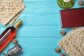 Flat lay composition with symbolic Passover Pesach items on wooden background Royalty Free Stock Photo