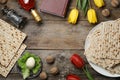 Flat lay composition with symbolic Passover Pesach items on wooden background Royalty Free Stock Photo