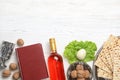 Flat lay composition with symbolic Passover Pesach items on wooden background Royalty Free Stock Photo