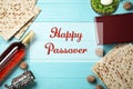 Flat lay composition of symbolic Pesach items on wooden background Royalty Free Stock Photo
