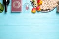 Flat lay composition with symbolic Pesach Passover Seder items on blue wooden table, space for text Royalty Free Stock Photo