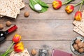 Flat lay composition with symbolic Pesach Passover Seder items on wooden table Royalty Free Stock Photo