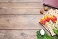 Flat lay composition with symbolic Pesach Passover Seder items on table, space for text Royalty Free Stock Photo