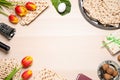 Flat lay composition with symbolic Pesach Passover Seder items on table, space for text Royalty Free Stock Photo