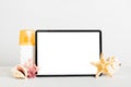 Flat lay composition with tablet and beach accessories on colored background. Tablet computer with blank screen mock up Royalty Free Stock Photo
