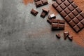 Flat lay composition with tasty chocolate on grey. Space for text Royalty Free Stock Photo