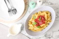 Flat lay composition with tasty pasta on white marble table Royalty Free Stock Photo
