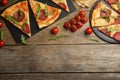 Flat lay composition with tasty pepperoni pizza on table. Space for text Royalty Free Stock Photo