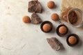 Flat lay composition with tasty raw chocolate truffles on light background Royalty Free Stock Photo