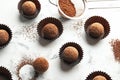 Flat lay composition with tasty raw chocolate truffles Royalty Free Stock Photo