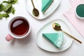 Flat lay composition with tasty spirulina cheesecake Royalty Free Stock Photo