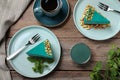 Flat lay composition with tasty spirulina cheesecake Royalty Free Stock Photo