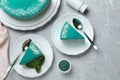 Flat lay composition with tasty spirulina cheesecake Royalty Free Stock Photo