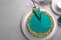 Flat lay composition with tasty spirulina cheesecake on table, space for text Royalty Free Stock Photo