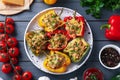 Flat lay composition with tasty stuffed bell peppers on wooden table Royalty Free Stock Photo