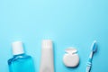 Flat lay composition with toothpaste, oral hygiene products and space for text Royalty Free Stock Photo