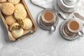 Flat lay composition with tray of cookies for Islamic holidays and cups. Eid Mubarak