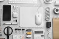 Flat lay composition with wired computer mouse and stationery on grey table. Space for text Royalty Free Stock Photo