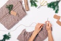 Flat lay composition young woman's hands knitting