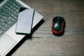 Flat lay, computer mouse, smartphone and laptop on wooden table, copy space Royalty Free Stock Photo