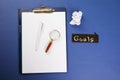 Flat lay of concept of search idea, goals, Business image, Magnifying glass and crumpled paper