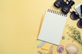 Flat lay concept of travel accessories vacation trip and long summer weekend planning on yellow table with blank space for text Royalty Free Stock Photo