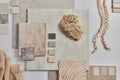 Flat lay of creative architect moodboard composition with samples of building, textile and natural materials and personal.