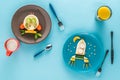 Flat lay with creatively styled children`s breakfast with drinks