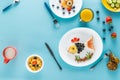 Flat lay with creatively styled children`s breakfast