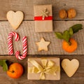 Flat lay, Creatively wrapped and decorated christmas presents in boxes on vintage wooden background