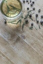 Flat Lay of Cup and Green Tea with Leafs, Rolls on Wood Back Royalty Free Stock Photo