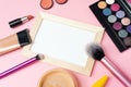 Flat Lay. Decorative cosmetics background. Top view. makeup brushes and cosmetics on a pink background. Mock up for designer and