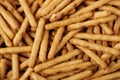 Flat lay of delicious mini pretzels sticks with copy space Royalty Free Stock Photo