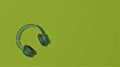 Flat lay design of music concept with headphone on mild green background with copy space, flat lay.