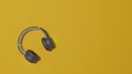 Flat lay design of music concept with headphone on yellow background with copy space, flat lay.