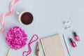 Flat lay desk with pink peony, cosmetics and accessories Royalty Free Stock Photo