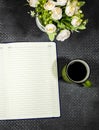 Flat lay desktop, flower`s pot and cup coffee with copy space for your text or design notebook or agenda