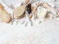 Flat lay different body brushes, white cotton towel, pumice, bamboo toothbrush, aromatic oil and a piece of soap. Zero waste Royalty Free Stock Photo