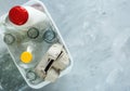 Flat lay of different wastes ready for recycling in white basket. Plastic, glass, paper. Social responsibility, ecology care Royalty Free Stock Photo