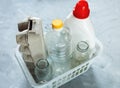 Flat lay of different wastes ready for recycling in white basket. Plastic, glass, paper. Social responsibility, ecology care, Royalty Free Stock Photo