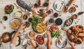 Flat-lay family having traditional Turkish breakfast with black tea Royalty Free Stock Photo