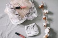 Female fashion background with lingerie, lipstick and flowers. Flat lay, top view. Beauty concept for blog, social media, magazine Royalty Free Stock Photo