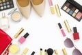 Flat lay feminine accessories collage with beige high heel shoes, sunglasses and cosmetics set on white background. Text space. Be Royalty Free Stock Photo