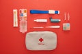 Flat lay with first aid kit, pills and medical objects Royalty Free Stock Photo